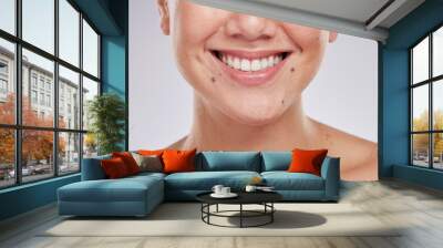 Face smile, dental and teeth of woman in studio isolated on a gray background. Skincare makeup, cosmetics and lips, mouth and oral hygiene of happy female model with veneers, invisalign and wellness. Wall mural