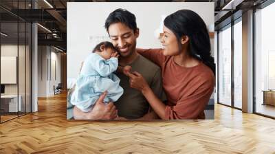 Love, baby and happy parents bonding and caring for their infant child in their comfy home. Happiness, smile and care with an interracial family, man and woman standing together in New york house Wall mural