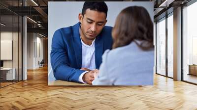 Your struggles develop your strengths. Shot of a unrecognizable woman comforting her colleague at work. Wall mural