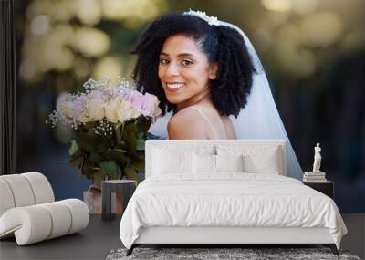 Bride, face and black woman with wedding and rose bouquet, happy in portrait with marriage and commitment outdoor. Event, celebration and happiness with smile in park married and Spring fashion Wall mural