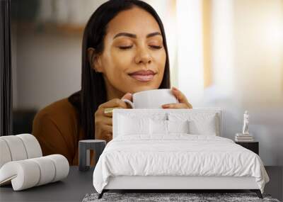 Happy smile, coffee and woman at home in a kitchen with a hot drink feeling relax and calm in the morning. Happiness, zen and young female in a house holding tea and mug in a household with mockup Wall mural