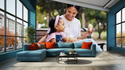 Summer, park and ice cream with a mother and daughter bonding together while sitting on a bench outdoor in nature. Black family, children and garden with a woman and girl enjoying a sweet snack Wall mural