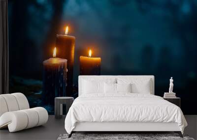 Lighted candles in an ancient cemetery, Halloween night Wall mural