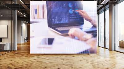 Business people abstract background concept. Woman pointing to computer screen with sale statistics Wall mural