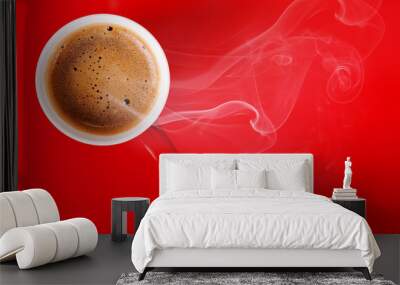 Fragrant coffee on a red background for your advertising. Smoke from hot coffee. Wall mural