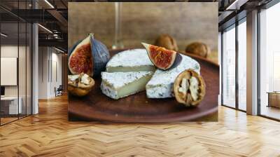 Handmade camembert cheese in herbs and figs Wall mural