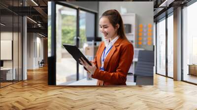 Business concepts, business people working in the work area with smartphones and data sheets at the des Wall mural