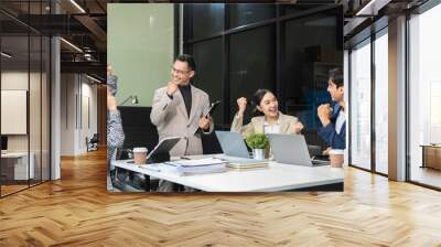 business people holding each others wrists, join hands together, support and unity, team strength and power, colleagues involved in team building activity. Wall mural