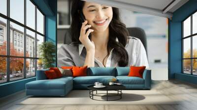 Business women talk mobile phones update tasks with milestones progress planning while working on laptop computers, online business, work from home, teleworking concept. Wall mural