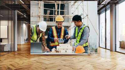 Construction team, blueprint and site building job for architect, builder and engineer sketching a construction project, green energy and solar panel concept Wall mural