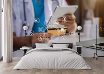 Doctor use credit cards to conduct financial transactions through phones, tablet, and laptop in the morning.  Wall mural