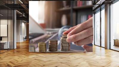 Money, Financial, Business Growth concept, Man's hand put money coins to stack of coins. Wall mural