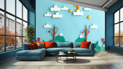 Paper cut-out scene with blue sky, white clouds, trees, and flowers. Wall mural