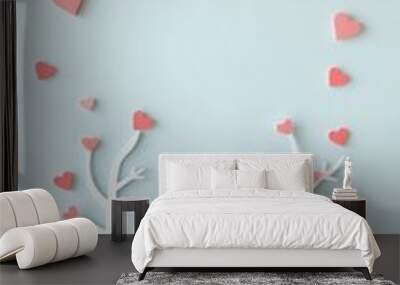 Papercraft blue sky with two white trees decorated with pink hearts. Wall mural