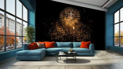 Gold fireworks on black background for winter and new year festivals Wall mural