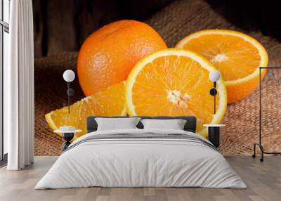 ripe oranges on wooden table Wall mural