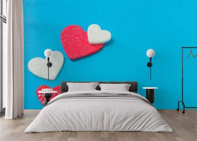  heart on blue background close up image. Wall mural