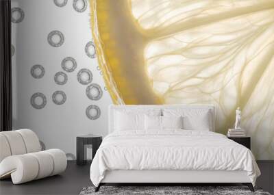 Fresh lemon slice in water with bubbles on white background Wall mural