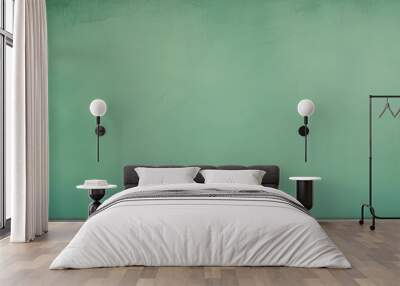 A textured green wall with a subtle pattern of lines and scratches, creating a sense of depth and texture. Wall mural