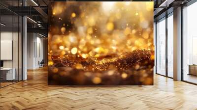 close-up view of a glittering, golden surface, with a blurred background that creates a bokeh effect. Wall mural