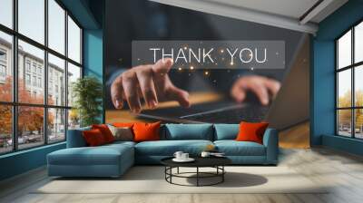 businessman using a laptop and touching the message thank you on a display screen. concept of thank you business, congratulations, and appreciation gratitude. presentation from technology digital Wall mural