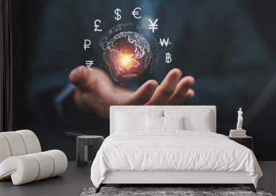 Online internet banking interbank payment concept. Man with virtual global currency symbols on hand. Money transfers and currency exchanges between countries of the world. Business finance. Wall mural