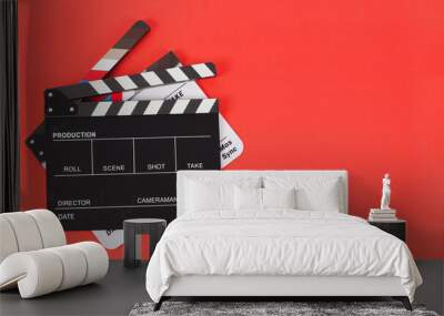 Two Black and white clapper board or movie slate on red background. full shot Wall mural