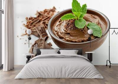 A chocolate mousse with a mint leaf, isolated on a white background Wall mural