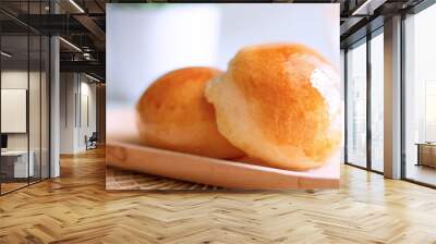 Close up two butter bread bun  on wooden plate Wall mural