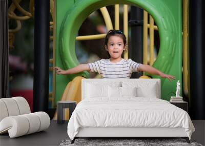 Little children having fun in the playground Wall mural