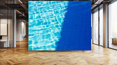 abstract of sun reflected in the water of the swimming pool : Bl Wall mural