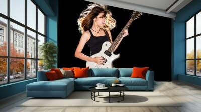 Young and beautiful rock girl playing the electric guitar Wall mural