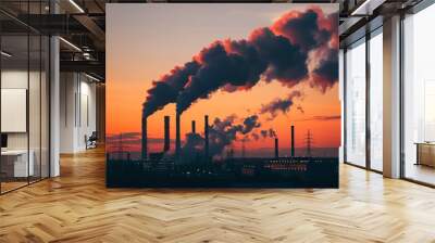 An industrial park at dusk, smokestacks releasing smoke into the darkening sky Wall mural