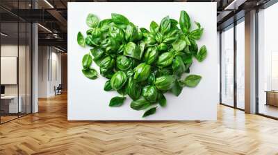 Basil leaves forming a green heart shape, symbolizing love for cooking and fresh ingredients, isolated on white Wall mural