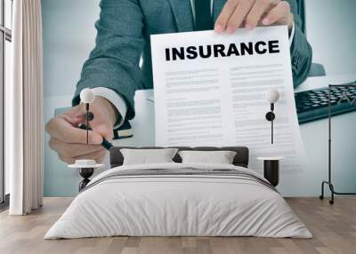 young man in suit showing an insurance policy Wall mural