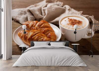 cup of cappuccino coffee and croissants Wall mural