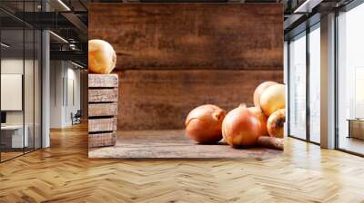 fresh onions in a wooden box Wall mural