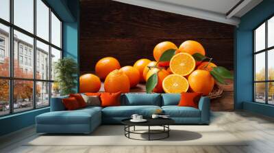 fresh orange fruits with leaves Wall mural