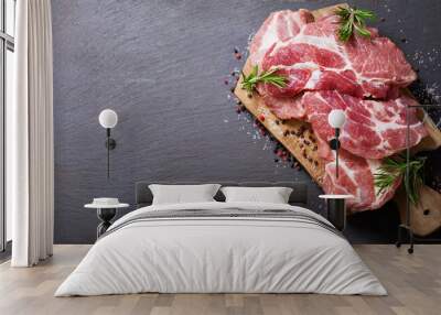 fresh pork meat with rosemary and spices, top view Wall mural