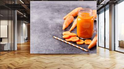 glass of fresh carrot juice with vegetables Wall mural