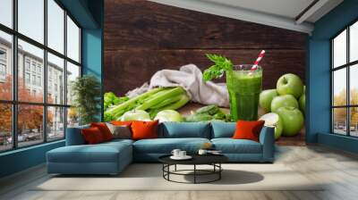 glass of green juice smoothie with spinach, apple and celery Wall mural