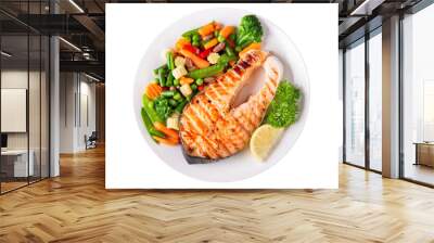 plate of grilled salmon steak with vegetables isolated on a white background Wall mural