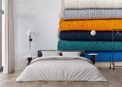 stack of colourful cotton clothes, close up pile of clothing Wall mural