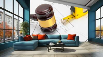 judge gavel with measure tape above construction blueprint Wall mural