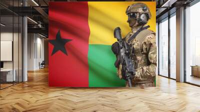 Soldier in helmet holding machine gun with flag on background series - Guinea-Bissau Wall mural