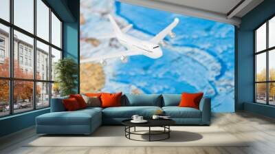 Travelling, tourism and all things related series - plane over world map Wall mural