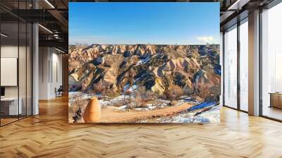 Goreme valley with ancient cave chapels houses city carved into mountain hillside, Cappadocia, Turkey
 Wall mural