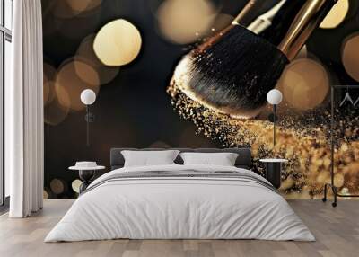 Golden powder bursts from a makeup brush on a dramatic dark background display Wall mural