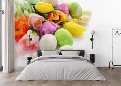 Easter eggs with tulips flowers on white background Wall mural