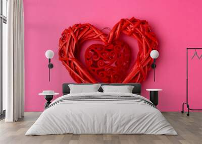 red wicker decorative heart on a pink background Wall mural